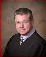 Law vs. Jones: 3rd Court Race Has Political History