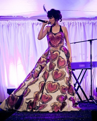 Larissa Ness performs her hit Get to It while wearing Rachelle Briton's Queen of Hearts dress.