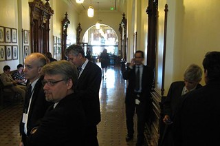 Hurry up and wait: The Capitol press corps waits in the Senate back corridor for the school finance conference committee to emerge. Or Christmas, whichever comes first