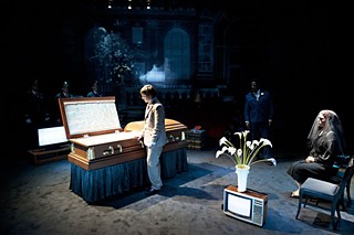 Young Jon Moscone (Tyler James Myers) at his father's casket in OSF's <i>Ghost Light</i>