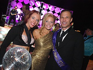 The Dancing With the Stars Austin winner for 2011 is Vaughn Brock (r),  of Brock Investment Group, with his professional dance partner Teletha Jouzdani (l) and dance director/emcee Sabrina Barker-Truscott (c).