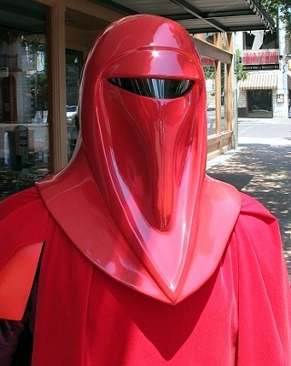 An imperial guard from the 501st Battalion of Star Wars cosplayers leads the way to last week's test screening of 5-25-77