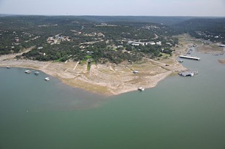 This photo, taken in June, shows Lake Travis' water levels still low, despite this year's rainfall. Travis and Lake Buchanan, the region's water supply reservoirs, are currently less than half full, holding a combined total of about 949,883 acre-feet of water.
