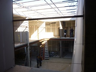 Looking up the breezeway toward the Canopy's Buildings 2 and 1, from the front of the designated cafe space in Building 3