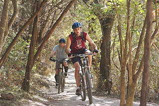 Item 51 from Chris Riley proposes a one-year pilot program allowing 24-hour hiking and biking on three greenbelts around town.