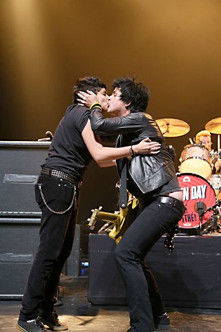 Geek Stink Breath: Billie Joe Armstrong smooches a fan at Green Day's SXSW showcase.