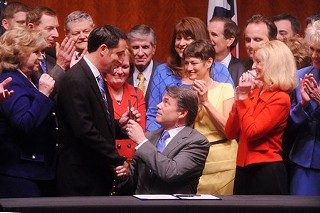Inside the Capitol Auditorium Gov. Rick Perry today signed HB 2 into law with Sen. Glenn Hegar, the bill sponsor