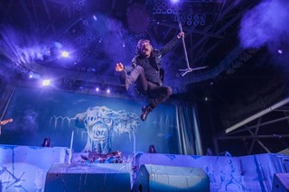 Bruce Dickinson gets airborne early in Iron Maiden’s performance in Austin, Sept. 10
