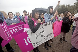 Luz Hernandez (l) and Doresia Gutierrez at a February 2012 Planned Parenthood rally in support of birth control as part of health care coverage provided by Catholic or other religious-affiliated employers opposed to contraceptives