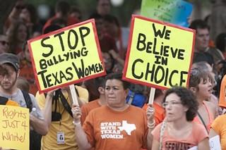 Women protesting HB2 at the Capitol this summer