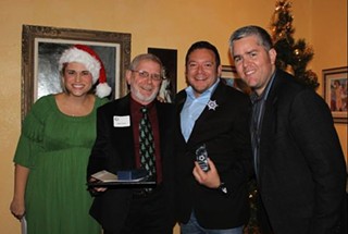 Musician Lindsey Leaverton, Care Communities' Roger Temme, new AGLCC board vice-president Edgar Gierbolini, and current AGLCC board president Jimmy Flannigan
