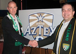 Dalglish (l) shakes hands with Aztex owner David Markley.