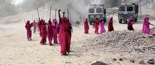 Pink Saris and Big Sticks