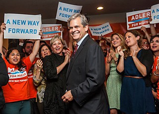 Surrounded by supporters at his campaign headquarters on Barton Springs Road, Austin mayoral candidate Steve Adler celebrates winning enough votes (37%) to head into a runoff with Council Member Mike Martinez (30%).  The two candidates will duke it out in December.