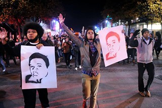 Protesters march in Austin last Tuesday, Nov. 25.