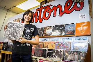 Antone's Records co-owner Eve Monsees grips some sweet Doug Sahm vinyl.