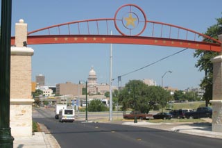 The gateway arch on 11th Street symbolizes the ARA's vision of relinking Central East Austin to Downtown and the city at large.
