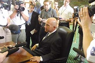 Houston state Sen. John Whitmire faces the press after announcing that he was crossing the (state) line.