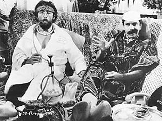 Tommy Chong with partner Cheech Marin in their 1983 movie <i>Still Smokin'</i>.