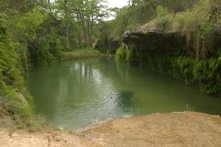 A Lick Creek swimming hole, once clear and now clouded by development runoff