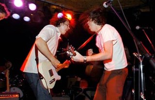 Literally rockin': Zykos' Mike Booher (l) and Okkervil River's Will Sheff