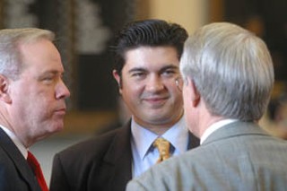 Rep. Eddie Rodriguez, center, chats with Rep. Gary Elkins, R-Houston (l), and Rep. Robert Talton, R-Pasadena.