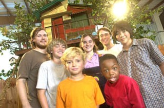 Bryan Poyser (l) and Jake Vaughan (second from right) with cast members of <i>The Cassidy Kids</i> at Austin Studios' hangar 4.
