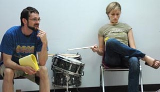 Andrew Bond and Liz Fisher work on Team Permutations' <i>The Empty Bowl</i>.
