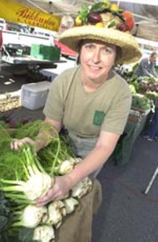 Suzanne Santos, farmers' market program director at the Sustainable Food Center, at the downtown farmer's market