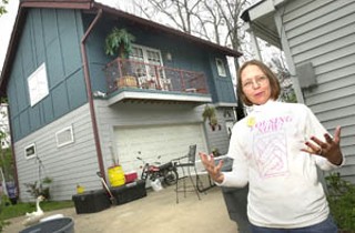 Lori Renteria's backyard castle is her defense against spiraling property taxes.