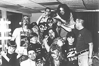 Jason McMaster (center, with pot leaf hat on), the late Dimebag Darrell (with camera), and friends