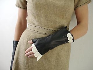 This vintage leather glove has been cleverly restyled and 
embellished by accessories designer Alyson Fox as part of 
her fall 2006 collection, available on her Web site now and 
in stores soon.