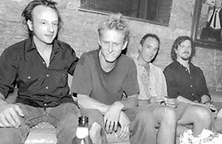 MONSTERS SHE SAID: Even in 1998, a Scratch Acid oral history was a no-brainer. With the Jesus Lizard – featuring David Yow (far left) and David Wm. Sims (far right) – headlining Stubb's, and locals Rey Washam (l) and Brett Bradford (r) stopping backstage to say hey, the <i>Chronicle</i> dispatched a photographer. The piece didn't happen, nor did the picture. Until now.