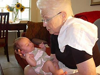 Last photo taken of Ann Richards, with her newest grandchild, Kate Lucia Johnson, daughter of Ellen Richards and Greg Johnson. The photo was taken in June 2006, in Houston, by Ellen Richards. Kate was 4 weeks old in June, and Ann was seeing her for the first time.<br>Photo courtesy of Ellen Richards