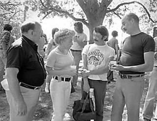 Young Ann Richards, 1977, with some Democratic activists and then-husband Dave Richards (at right)