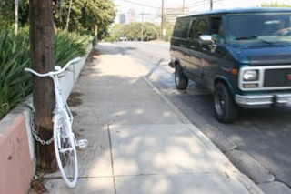 Near where Miller was hit, a white ghost bike commemorates a bicyclist, Krishna Walters, who was killed Oct. 29, 2001, when she fell in front of a Cap Metro bus.