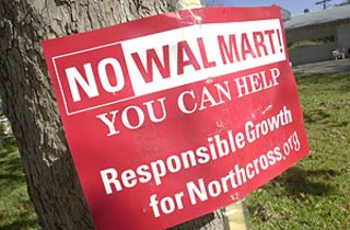 If anyone wonders what kind of reception Wal-Mart will receive in the Northcross Mall location, drive around Crestview, Allandale, and other surrounding neighborhoods, where these signs are sprouting up like weeds.