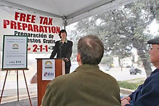 Community Tax Centers will again offer free tax services for low-income
families, announced Elizabeth Colvin of Foundation Communities on
Tuesday. Foundation Communities sponsors the tax centers, which are
staffed by IRS-trained volunteers offering tax-preparation services such
as electronic filing.
Individuals with incomes up to $25,000, or house­holds making up to
$50,000, are eligible (slightly higher incomes are allowed for
households of five or more).
Listening to Colvin are Foundation Communities Executive Director Walter
Moreau (l) and former Mayor Gus Gar­cia. For more info, dial the United
Way’s 2-1-1 line or go to <a href=http://www.communitytaxcenters.org target=blank><b>www.communitytaxcenters.org</b></a>.