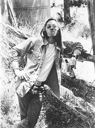 Pictured here outside his house by the long-defunct Soap Creek Saloon, Doug Sahm smoked and toked his way into pot culture. Sometimes you’d find him standing out back of the club not sharing the joint he was smoking. “I only brought enough for the gig!” he’d claim.
<br>Photo courtesy of Shawn Sahm