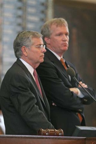 On the dais, House Speaker Tom Craddick faces down rebellion beside his instant parliamentarian, former Rep. Terry Keel