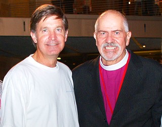Mayor Will Wynn and the Rev. Troy Perry, whose revolutionary 1972 book, <i>The Lord Is My Shepherd and He Knows I'm Gay</i>, has made him an icon, pose together on the dais at the opening party for the Austin Gay & Lesbian International Film Festival. A documentary on Perry premiered earlier in the evening.