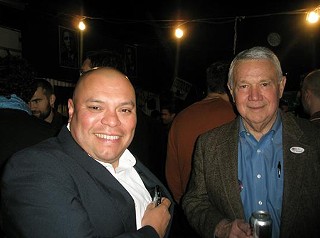 Council Members Mike Martinez (l) and Lee Leffingwell took in the Obama
party at Scholz