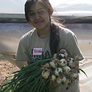Veronica Garcia holding onions