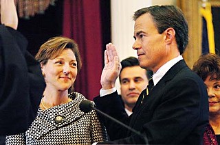 With his wife, Julie Brink Straus, by his side, two-term state Rep. Joe Straus, R-San Antonio, was sworn in Tuesday by Chief Justice Wallace Jefferson as the new speaker of the Texas House. In his opening remarks to members, Straus, who won by acclamation, promised to create an atmosphere where everyone's voice can and will be heard. (See <a href=http://www.austinchronicle.com/gyrobase/Issue/story?oid=oid%3A726736><b>A New Day</b></a> for more photos.) – <i>Richard Whittaker</i>