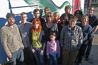 These activists believe Brandon Darby reported on their activities to the FBI. Those interviewed for this story include Scott Crow (back, center). Next to Crow is Ann Harkness. Simon Evans is back row, far right, and Lisa Fithian stands in front of Evans.