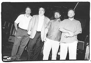 left to right: Joe Ables (owner of Saxon Pub), Clifford Antone (Antone's), Danny Crooks (Steamboat), and Craig Hillis (former owner of Steamboat)