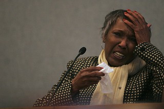 Ruby Session, mother of Timothy Cole, cries on the witness stand last week in a Travis Co. courtroom.