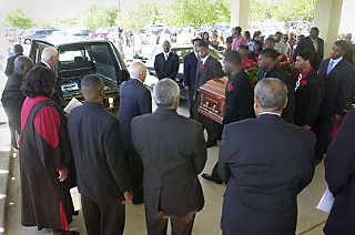 Pallbearers carry the casket of Nathaniel Sanders II at funeral services Monday for the 18-year-old, who was killed May 11 by an Austin police officer The shooting remains under an investigation.