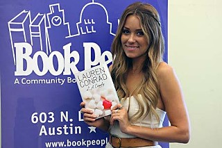 Tanorexic celebutard Lauren Conrad at her booksigning at BookPeople. They come and go, don't they?