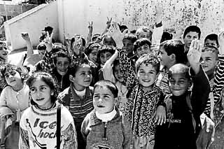 School children in Dheisheh. The two elementary schools in the camp, one for  boys and one for girls, are operated by the United Nations Relief & Works Agency.  After the ninth grade, children attend public schools in Bethlehem.